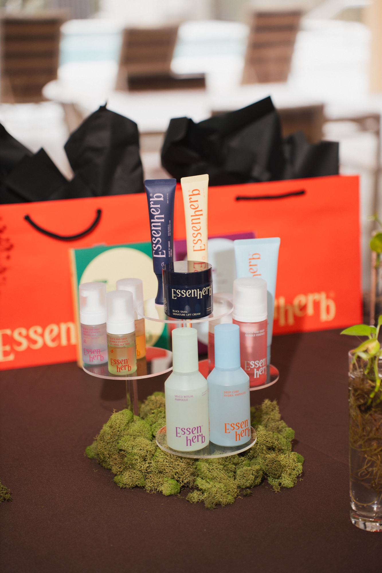 Product display close-up with orange gift bag